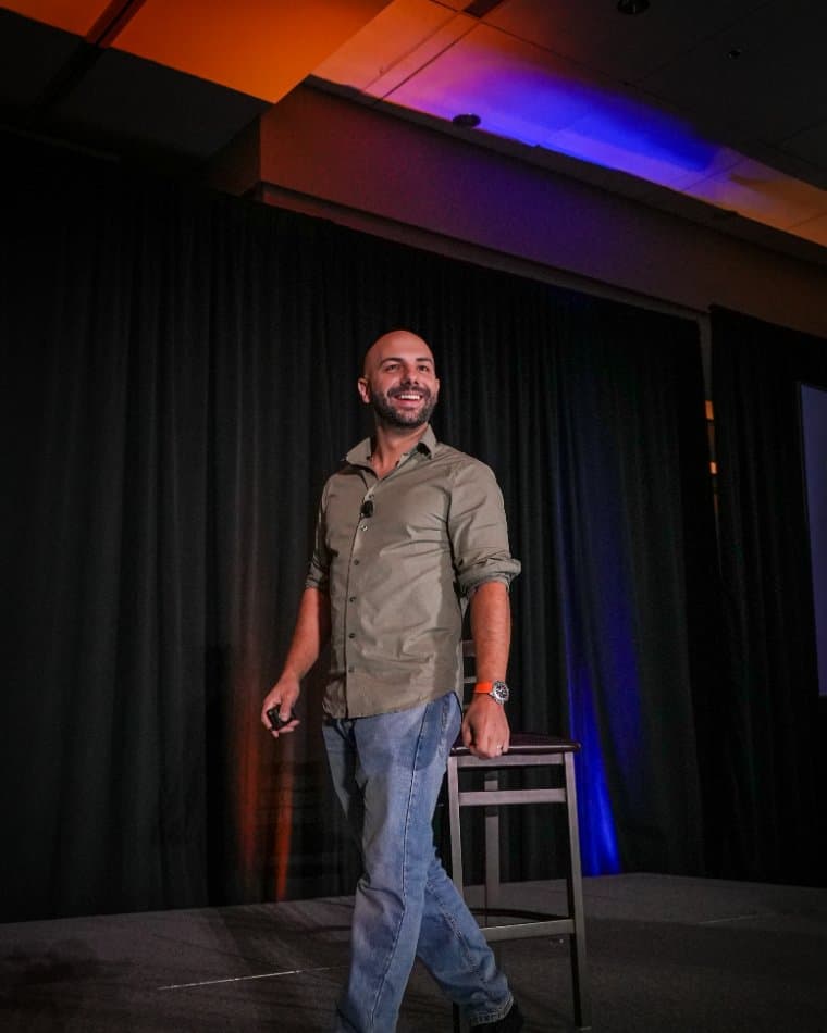 Markian Sich on stage at MILREICON
